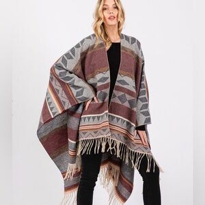 Aztec Pattern Fringe Ruana Poncho
Color Burgundy
Theme Fringe